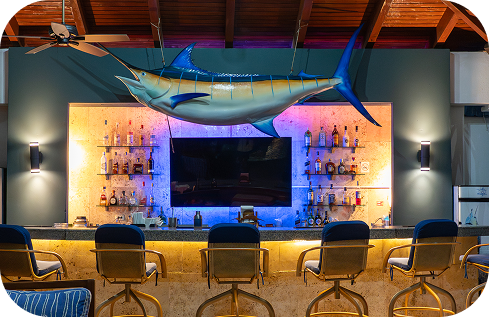 Bar area with marlin decor at Pacific Fins